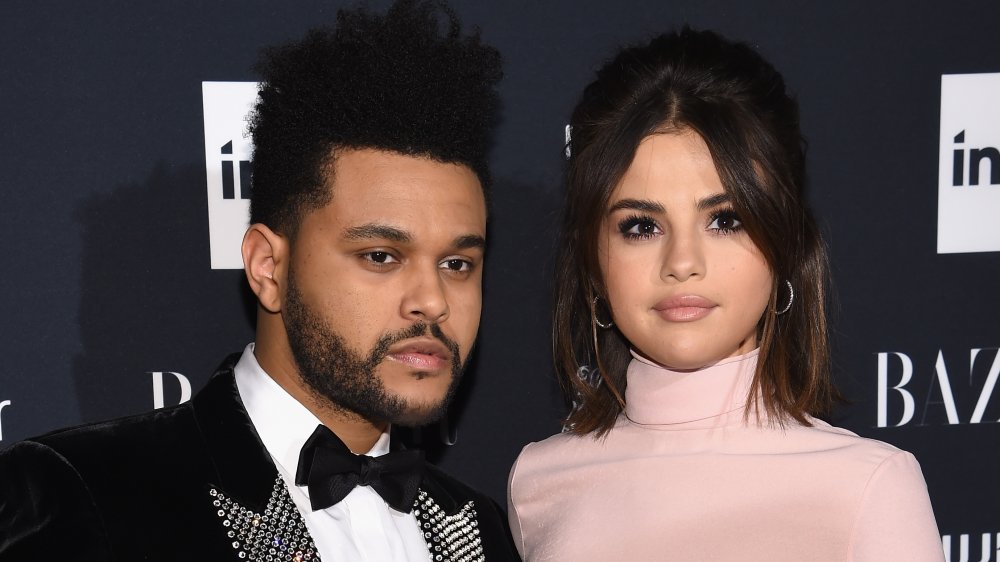 The Weeknd and Selena Gomez at Harper's BAZAAR celebration of "ICONS by Carine Roitfeld." 