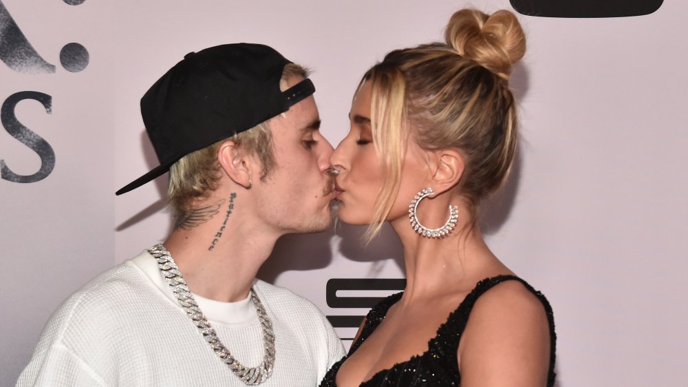 Justin Bieber and Hailey Baldwin kissing at the premiere of YouTube Originals' Justin Bieber: Seasons 