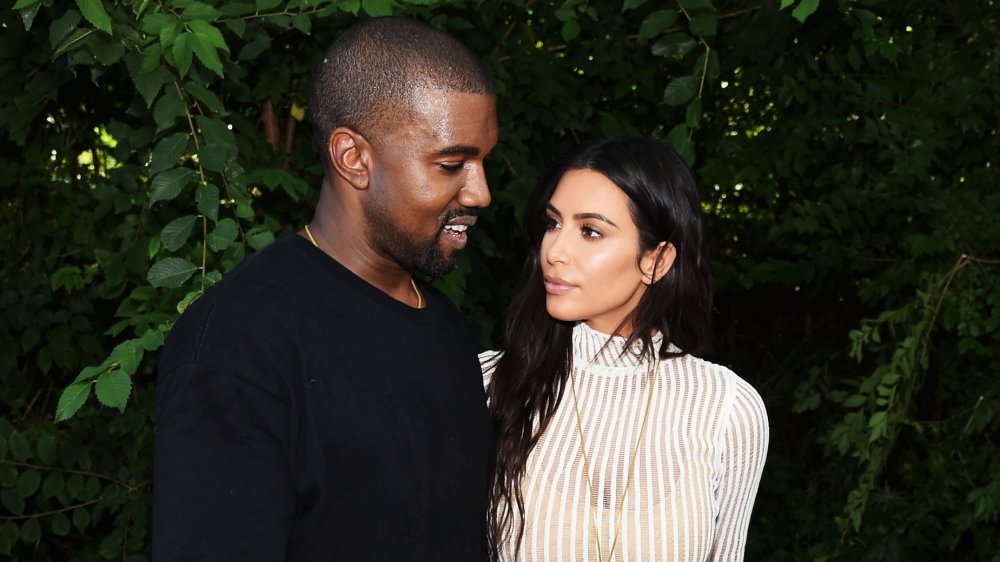 Kim Kardashian looking longingly at Kanye West