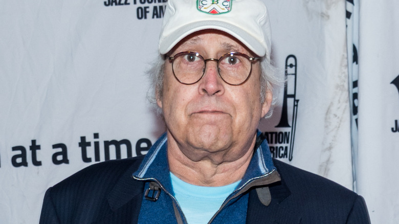 Chevy Chase posing at event