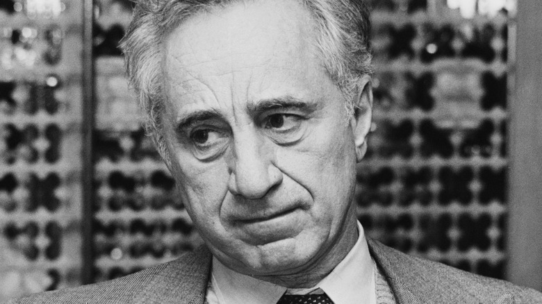 Elia Kazan posing in suit