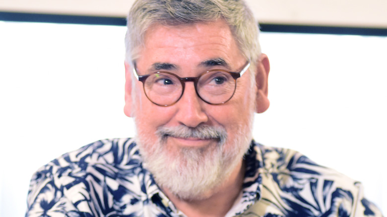 John Landis smiling at event