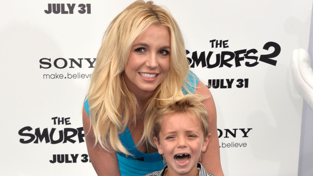 Britney Spears with her son who is crying