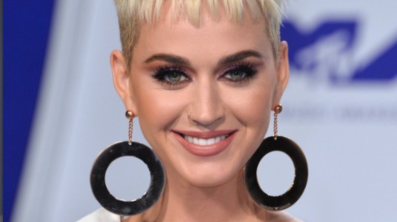 Katy Perry with pixie cut, earrings