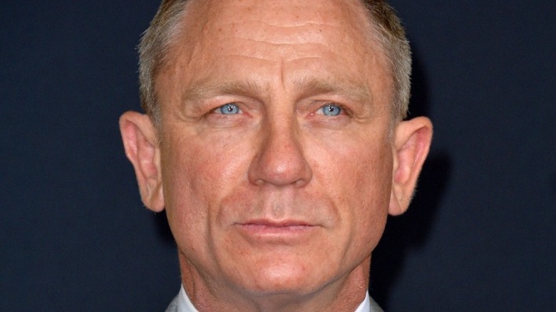 Daniel Craig with a serious expression