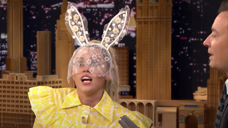 Miley Cyrus wearing bunny ears