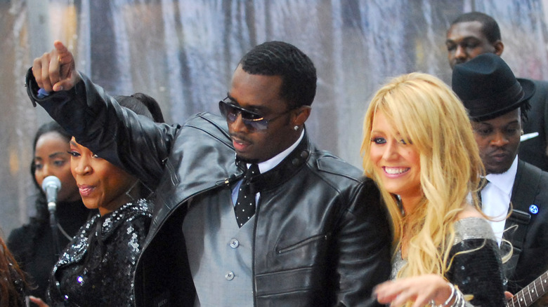 Aubrey O'Day and Sean Combs performing