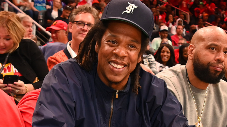 Jay Z smiling at game