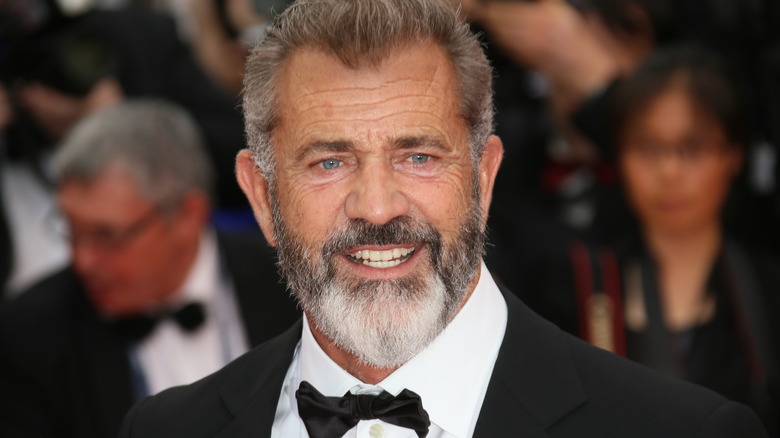 Mel Gibson smiling in tux