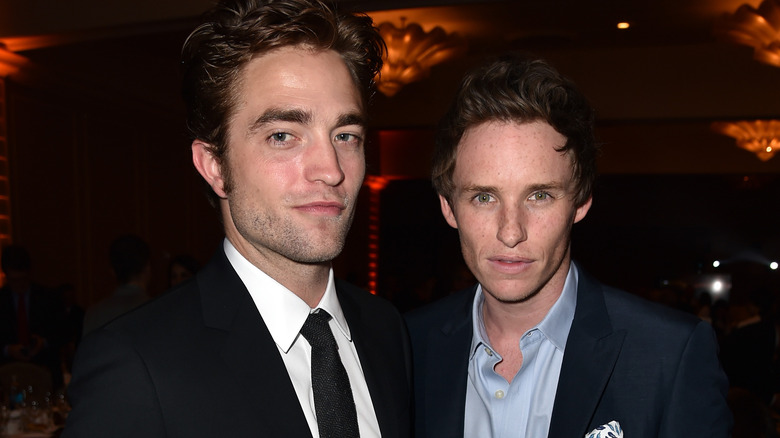 Robert Pattinson Eddie Redmayne posing