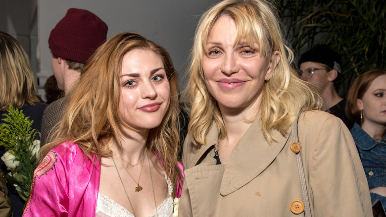 Frances Bean Cobain smiling with Courtney Love