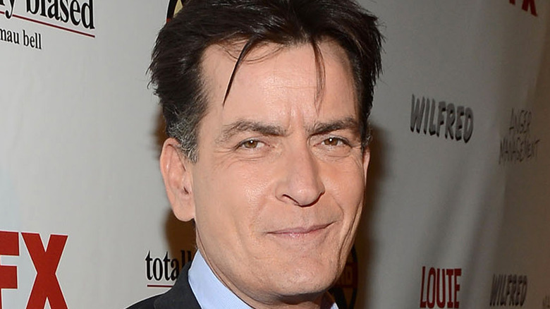 Charlie Sheen smirking 