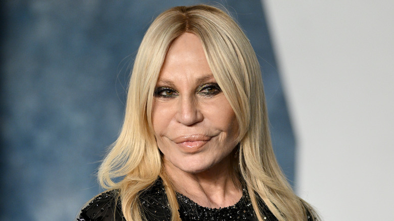 Donatella Versace in black top