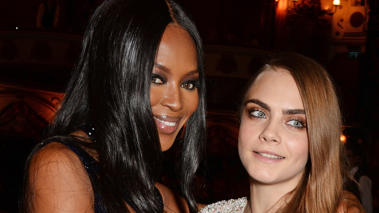 Naomi Campbell and Cara Delevingne smiling