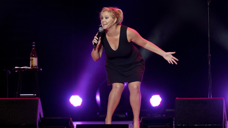 Amy Schumer performing onstage