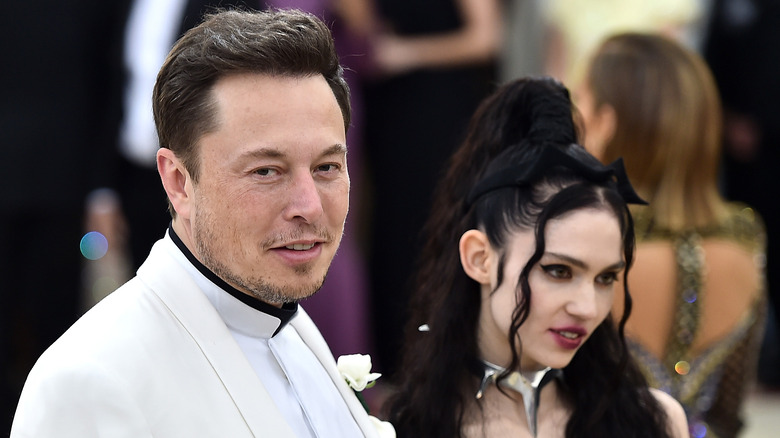 Elon Musk and Grimes on red carpet