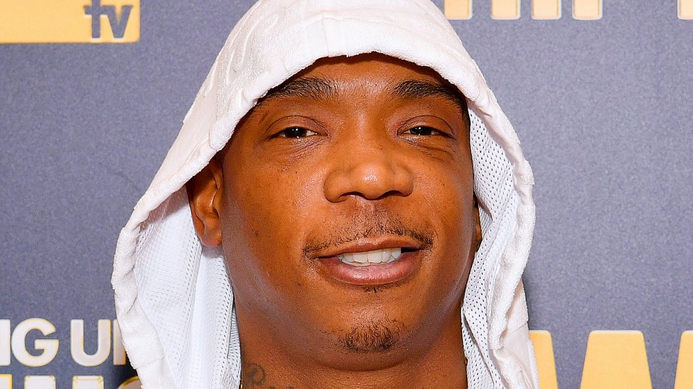 Ja Rule with white hoodie pulled up