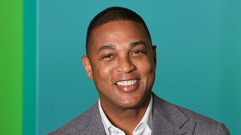 Don Lemon posing for cameras and smiling