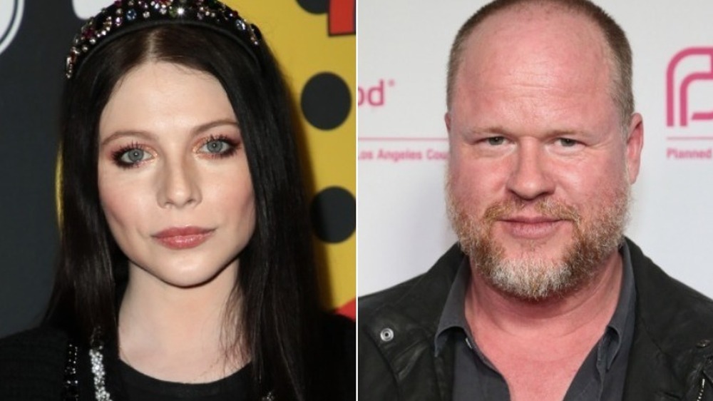 Michelle Trachtenberg smirking (left), Joss Whedon smirking (right)