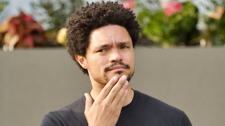 Trevor Noah pondering