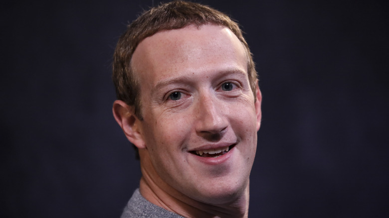 Mark Zuckerberg short hair smiling