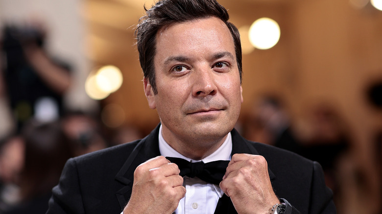 Jimmy Fallon adjusting bowtie 