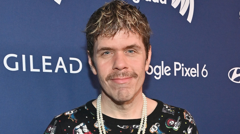 Perez Hilton, smiling