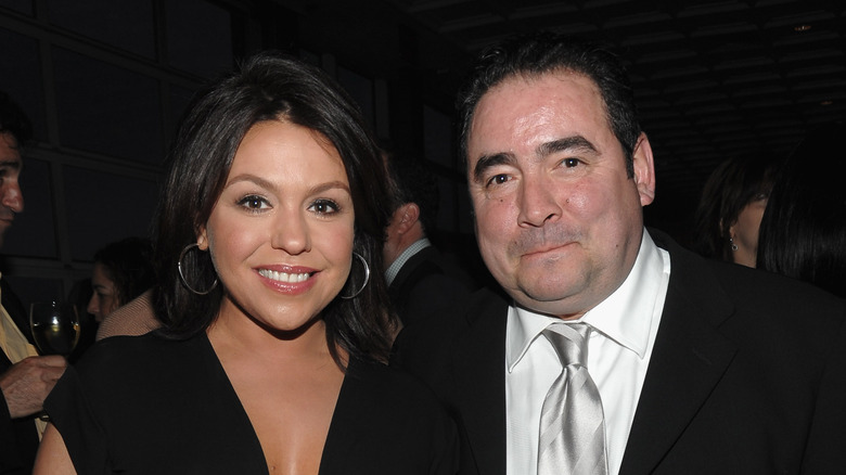 Rachael Ray and Emeril Lagasse smiling