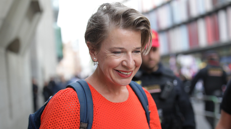 Katie Hopkins smiling and looking down