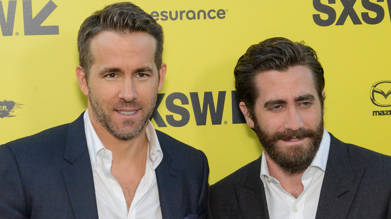 Ryan Reynolds and Jake Gyllenhaal posing