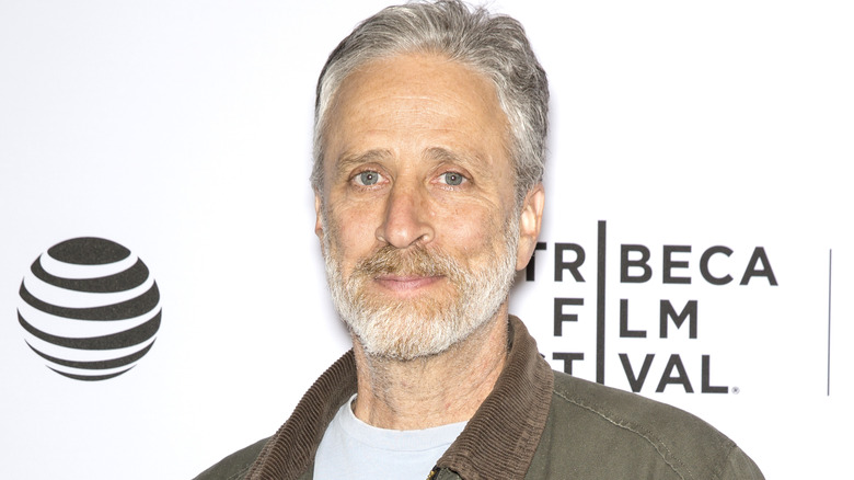 Jon Stewart posing on red carpet