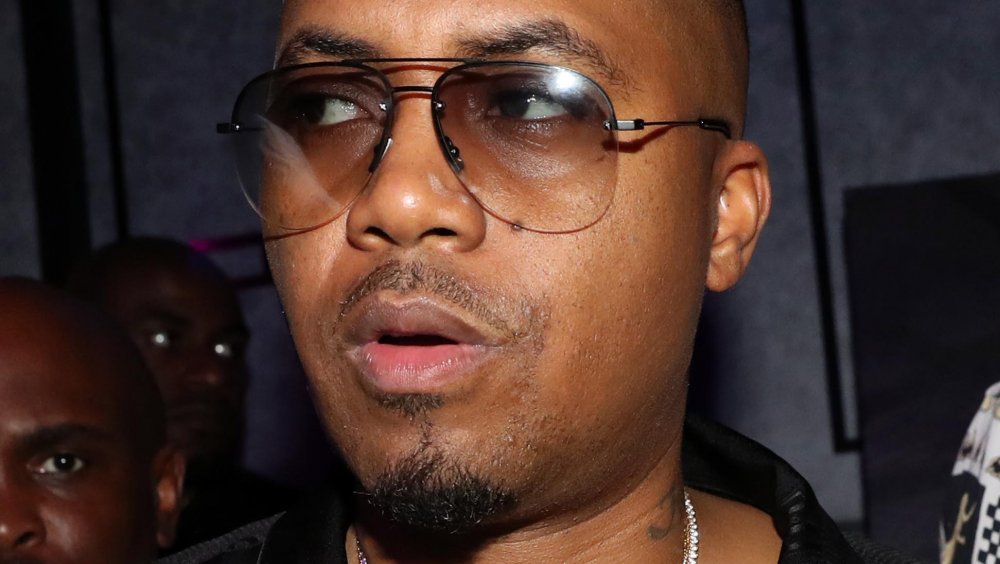 Nas looking left with his mouth open