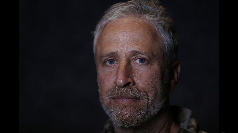 Jon Stewart with a neutral expression