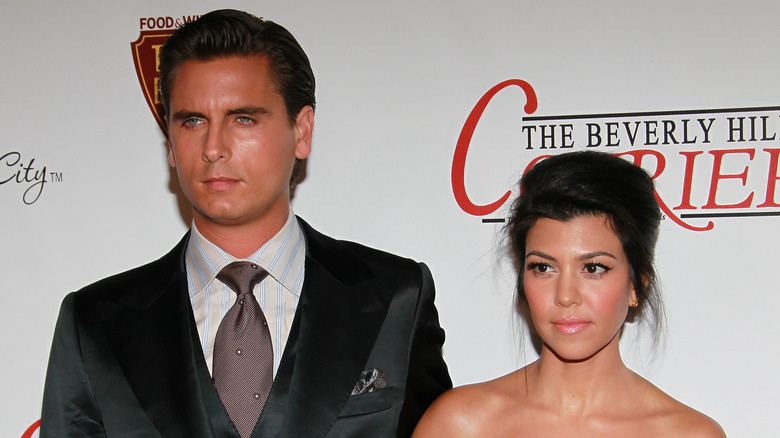 Kourtney Kardashian and Scott Disick posing