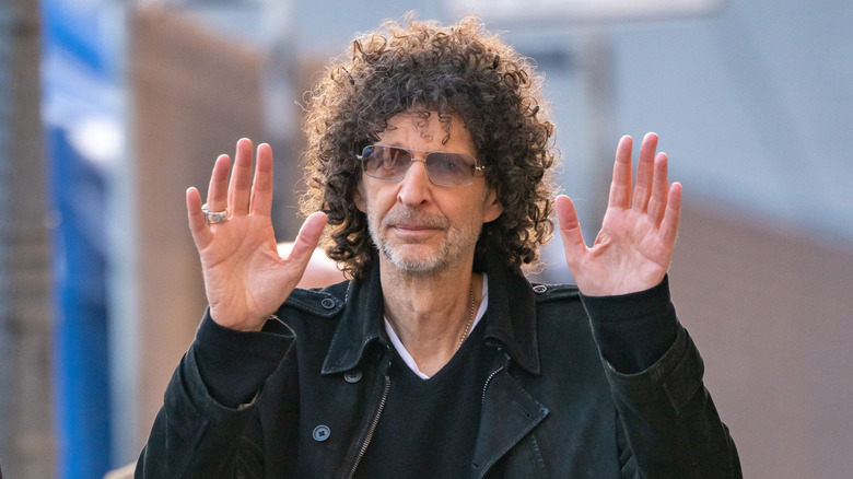 Howard Stern wearing a black jacket