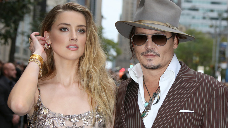 Johnny Depp and Amber Heard on the street