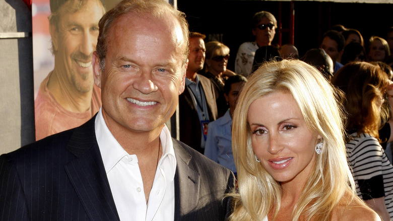 Kelsey Grammer and Camille Grammer posing for cameras