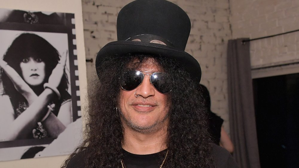 Slash in a top hat and aviators