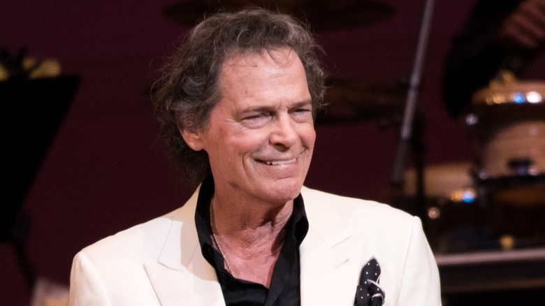 Musician B.J. Thomas smiling onstage