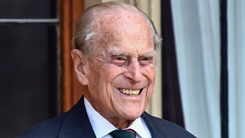 Prince Philip, Duke of Edinburgh, smiles at a ceremony to mark the transfer of the Colonel-in-Chief of The Rifles from him to Camilla, Duchess of Cornwall at Windsor Castle on July 22, 2020 in Windsor, England. The Duke of Edinburgh has been Colonel-in-Chief of The Rifles since its formation in 2007 and has served as Colonel-in-Chief of successive Regiments which now make up The Rifles since 1953. The Duchess of Cornwall was appointed Royal Colonel of 4th Battalion The Rifles in 2007.