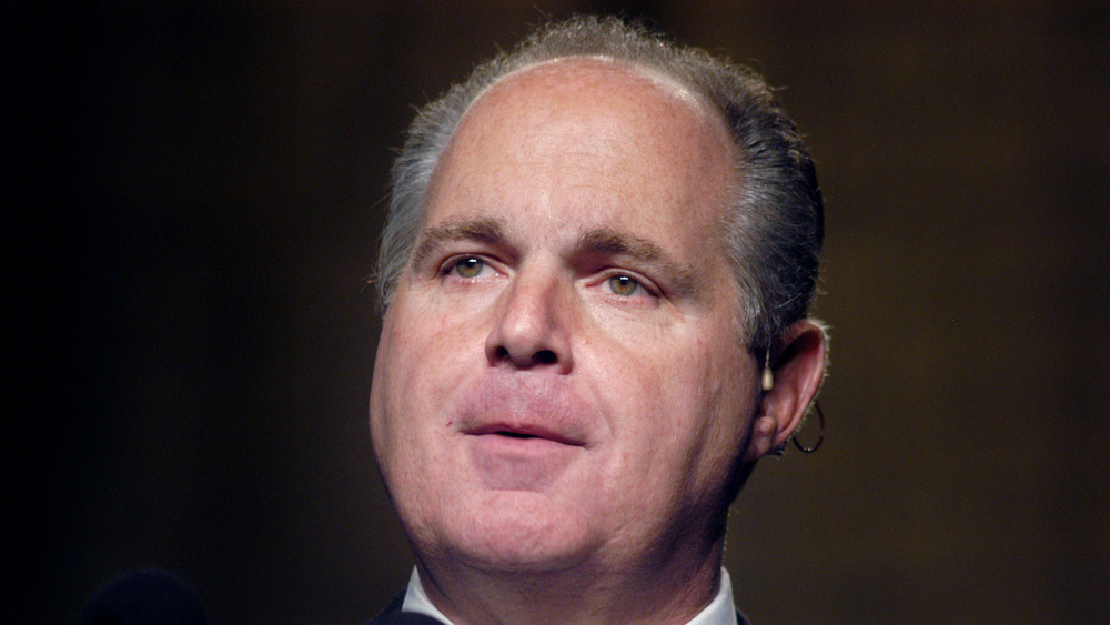 Rush Limbaugh speaks at a radio broadcasters' convention in 2003.