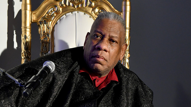 André Leon Talley sitting with a microphone