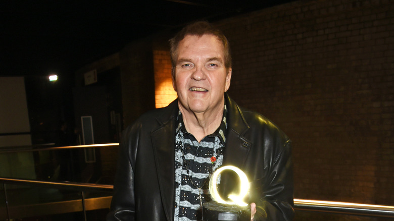 Meat Loaf holding an award
