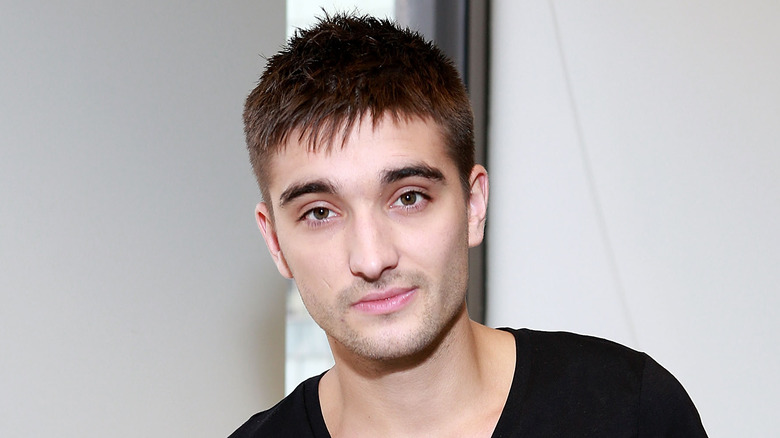 Tom Parker looking at camera