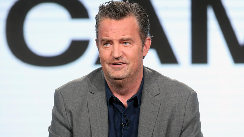 Matthew Perry, smiling