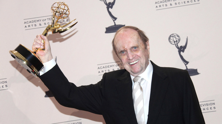 Bob Newhart holding an Emmy