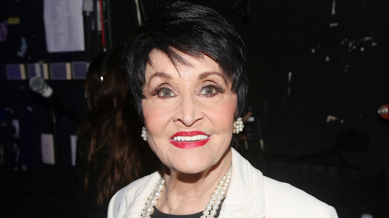 Chita Rivera smiling red lipstick