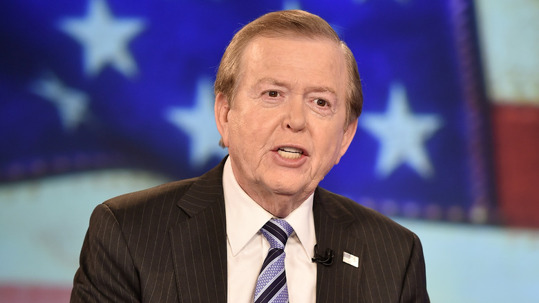 Lou Dobbs wearing flag pin