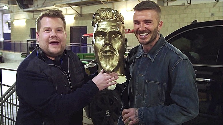 James Corden and David Beckham with statue