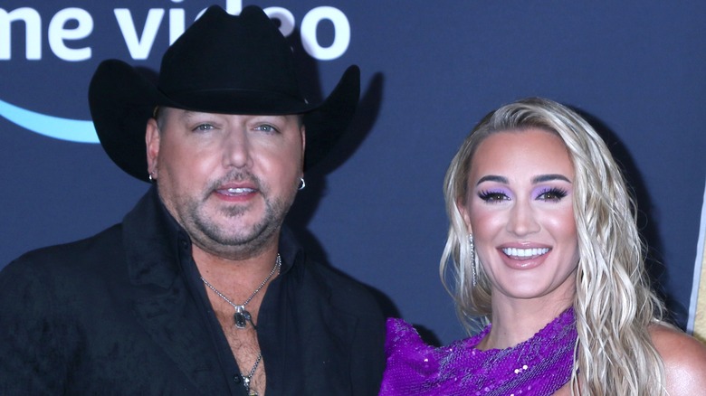 Jason and Brittany Aldean both smiling